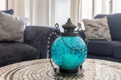 a blue vase sitting on top of a table at 2BR Free Parking Walk to Convention Center in San Diego