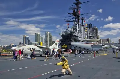 a group of people on a ship with a plane at Walk to Conv Center Free Parking 4 Beds in San Diego