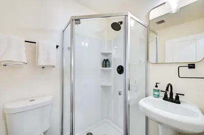 a bathroom with a shower and a toilet and a sink at Pet-Friendly San Diego Studio about 14 Mi to Downtown in San Diego