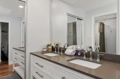 a bathroom with two sinks and a large mirror at 628 Escape to Relaxation-Free Wifi-Free Parking in Encinitas