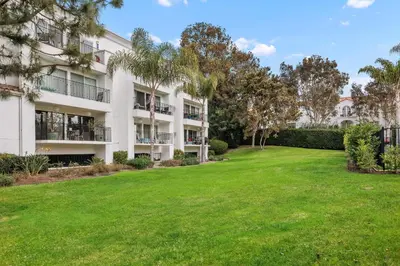 a large yard in front of a building at 644 A Renovated Condo at a World-Renowned Resort - Free Wifi and Parking in Encinitas