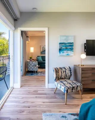 a living room with a view of the ocean at 645 Fresh Modern Condo Inside Resort Gates - Free Wifi - Walk to Spa in Encinitas