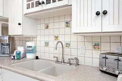 a kitchen with a large white sink in a kitchen at 212A Beachfront View-Free Wifi in Oceanside