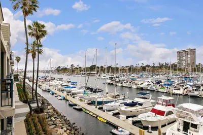 a marina filled with lots of boats in the water at 313B Steps from the Sand at Harbor Beach - Free Wifi in Oceanside