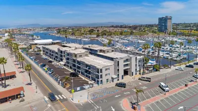 an aerial view of a marina with boats at 313B Steps from the Sand at Harbor Beach - Free Wifi in Oceanside
