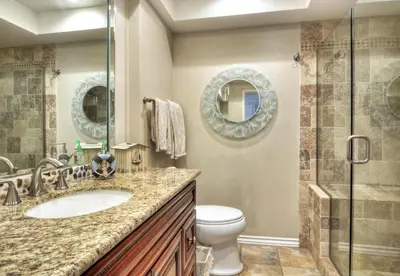a bathroom with a toilet and a sink and a shower at 314B Harbor View, Steps to the Beach, Free Wifi, Marina Del Mar 314B in Oceanside