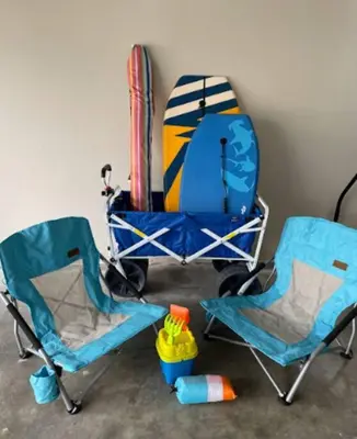 two chairs and a surfboard sitting next to a room at Entire house - 4 Bedroom & 2 Bath, 5 Min to Beach in Oceanside