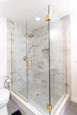 a bathroom with a glass shower with a toilet at Modern Luxury in Bonita - 2655sqft with Infinity Pool in Bonita