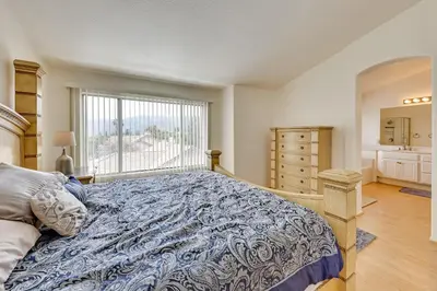 a bedroom with a large bed and a window at Lake Elsinore Vacation Rental about 4 Mi to the Lake! in Lake Elsinore