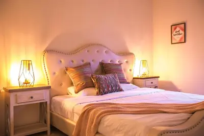 a bedroom with a large bed with two night stands at Irvine Spectrum/2 Bedrooms/2 Bathrooms/Apartment/pool/gym in Irvine