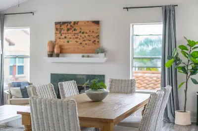 a dining room with a wooden table and chairs at Sunlit La Jolla Village Gem with Peak Ocean Views in San Diego