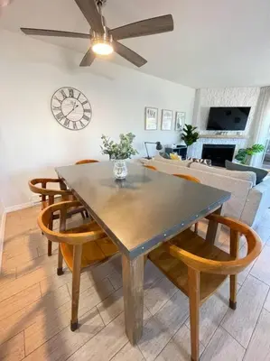 a dining table and chairs in a living room at IB Seaside Paradise w/ Ocean Views! in Imperial Beach