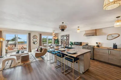 a kitchen and living room with a table and chairs at Living Lux in La Jolla - Beach - AC - Shops in San Diego