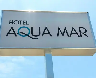 a sign for a hotel a la mar at Hotel Aqua Mar in San Diego
