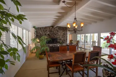 a dining room with a table and chairs at Poolside Splendor! Spacious De Anza Golf Club Home in Borrego Springs