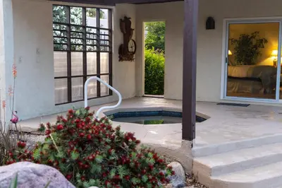 a house with a jacuzzi tub in a yard at Poolside Splendor! Spacious De Anza Golf Club Home in Borrego Springs