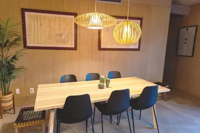a conference room with a wooden table and chairs at Pool and Mtn View! Designer Borrego Springs Hideaway in Borrego Springs