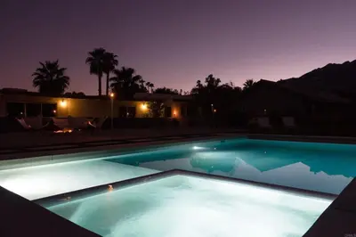 a swimming pool lit up at night at Pool and Mtn View! Designer Borrego Springs Hideaway in Borrego Springs
