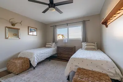 a bedroom with two beds and a window at 4Bd, Family Friendly, Fun Yard, Close to Beaches! in Oceanside