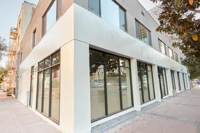 a building with large windows on a city street at Fabulous Urban Retreat in San Diego in San Diego