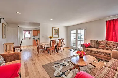 a living room with a couch and a table at Mtn-View Home Less Than 1 Mi to Lake Elsinore! in Lake Elsinore