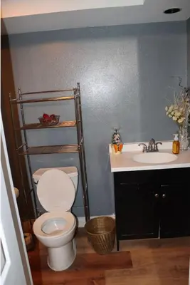 a bathroom with a toilet and a sink at Mountain View Studio in Hemet