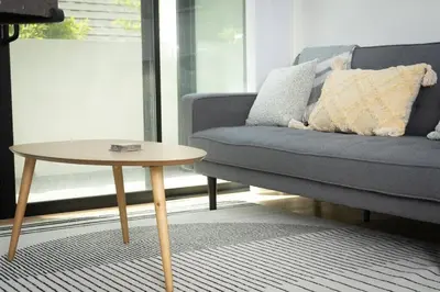 a living room with a couch and a coffee table at Bright and Trendy - Panoramic - Chic - Prime Location in San Diego