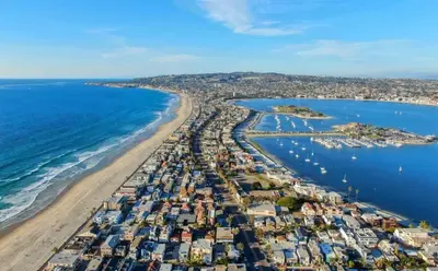 an aerial view of a beach and the ocean at Seaside Point Loma Home with Outdoor Patio in San Diego