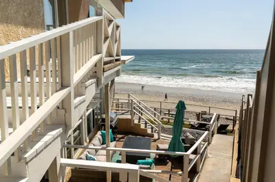 a view of the beach from the balcony of a beach house at CB-2445B - Carlsbad Casa De Los Sueños | Unit B in Carlsbad