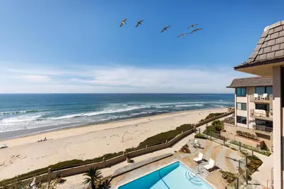 an aerial view of the beach and the ocean at SB-767D - Soothing Solana Oceanfront Condo in Solana Beach