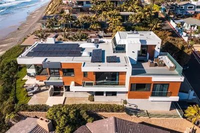 an aerial view of a house with solar panels on it at Unbeatable Location - Steps to Moonlight Beach in Encinitas
