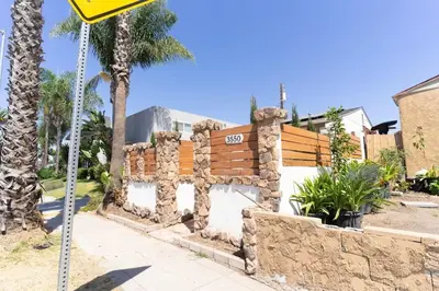 a street sign on the side of a street at Artfully-styled bungalow in the heart of it all in San Diego