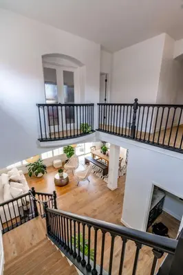 an overhead view of a living room with a fireplace at Carlsbad Dream House with Hot Tub Walk to Beach in Carlsbad