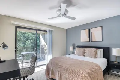 a bedroom with a bed and a desk and a window at La Jolla 1br w gym wd pool nr bars shops SAN-8 in San Diego