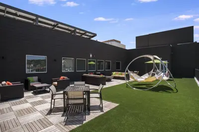 a patio with a table and chairs and a swing at Mission Valley 1br w gym wd pool nr bars SAN-14 in San Diego