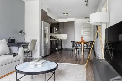 a living room with a couch and a table at Mission Valley 1br w gym wd pool nr bars SAN-14 in San Diego