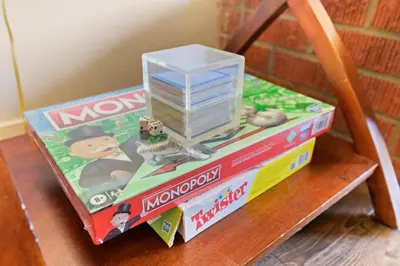 a stack of toy boxes sitting on a table at LOVELY Ocean View Beach House 3BR Sleeps 9 in San Diego