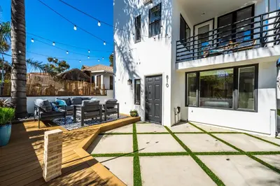 a home with a patio and a deck at Ocean & Bay Panorama 4 Levels Rooftop with Hot Tub in San Diego