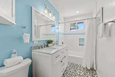 a bathroom with a sink and a shower and a toilet at South Park - Mountain Views - Central - Tranquil in San Diego