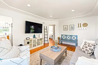 a living room with a couch and a table at South Park - Mountain Views - Central - Tranquil in San Diego