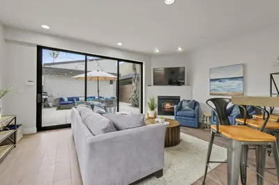 a living room with a couch and a table at Pacific Beach Paradise by Cardo -Spacious Retreat in San Diego