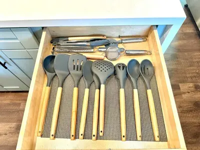 a drawer filled with spatulas and other kitchen utensils at Modern Home with View and Large Private backyard in San Diego