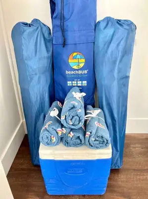 a pile of blue towels sitting on top of a blue bag at Modern Home with View and Large Private backyard in San Diego