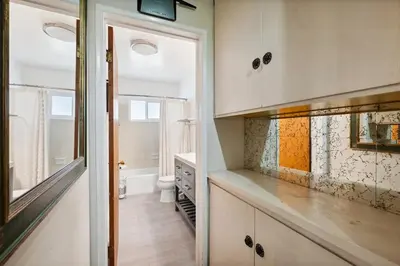 a bathroom with a sink and a toilet in a room at Family Retreat by Cardo - Sleeps 10 in National City