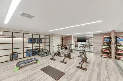 a gym with treadmills and machines in a room at Carmel Valley 2br w gym bbq wd nr dining SAN-28 in San Diego