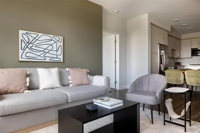 a living room with a couch and a table at Carmel Valley 2br w gym bbq wd nr dining SAN-28 in San Diego