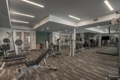 a gym with several treadmills and machines at Mission Valley 1br w gym wd pool nr bars SAN-18 in San Diego