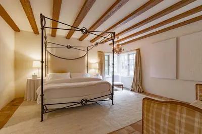 a bedroom with a canopy bed in a room at Idyllic Casita on Private Fairbanks Ranch Estate in Rancho Santa Fe