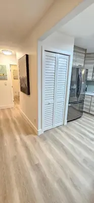 an empty living room with a large sliding door at Hillcrest San Diego Canyon Oasis in San Diego