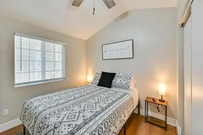 a bedroom with a bed and a window at Entire 2 Bedroom Pet Friendly Cottage Home in Alpine